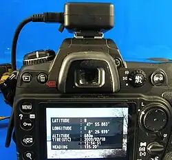 Nikon D300 with "Solmeta Geotagger N2 Kompass" on top