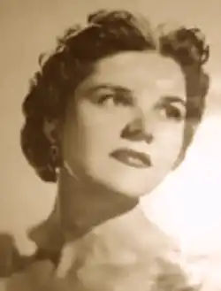 Black-and-white head shot of Smith looking right