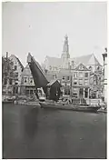 Wooden crane, looking westwards towards the Grote Kerk, Haarlem, shown with the corner of the Waag on the far right, by Adolphe Braun, 1865