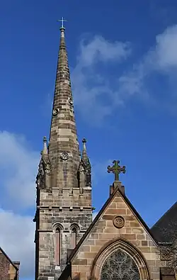 This is a photograph of the spire of St Benedict's Catholic Church on the Broadway site.