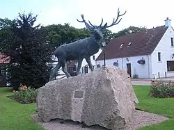 Statue of a stag outside Baxters Highland Village.