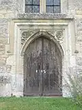 St John the Baptist parish church: west door to the tower