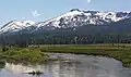Northeast aspect of Stevens Peak (right) from Hope Valley. Red Lake Peak to left.