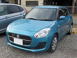 Pre-facelift Suzuki Swift with mesh grille (Japan)