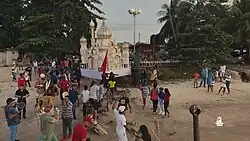 Tadjah being moved onto the beach to put it in the ocean