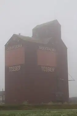 Former Saskatchewan Wheat Pool grain elevator in Tessier on a foggy morning.