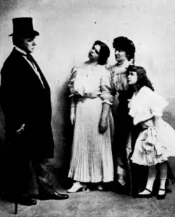 Black and white photo of four people