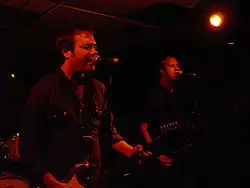 The Mr. T Experience performing live, showing members Dr. Frank (left) and Bobby J (right).