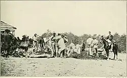The 1st Massachusetts Heavy Artillery Regiment bury dead Confederates at the Alsop Farm May 19, 1864
