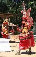 Muthappan Theyyam as Lord Vishnu and Lord Shiva