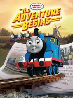 The Thomas & Friends logo and the stylised words "The ADVENTURE BEGINS" are above Gordon, Henry, James, and a windmill (from left to right). In the middle, a book that shows Edward and the Fat Controller are seen behind Thomas.