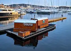 A sauna on a dock in the Tjuvholmen marina of Oslo, Norway
