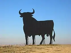Osborne bull sign in Las Cabezas de San Juan, Spain