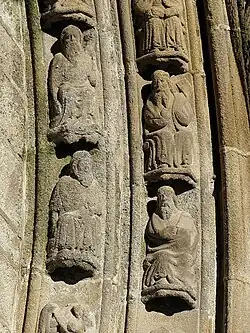 The voussoirs decorating the arch of the "porche des cloches".