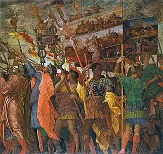 A tabula ansata carried on a stick – Triumphs of Caesar by Andrea Mantegna[5]
