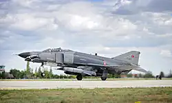 An F4E Phantom II aircraft with the Turkish Air Force (Türk Hava Kuvvetleri) takes off from Third Air Force Base Konya, Turkey, during Exercise Anatolian Eagle