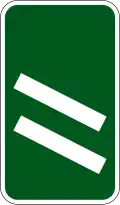 200 yd (180 m) to a roundabout or the next point at which traffic may leave a primary route