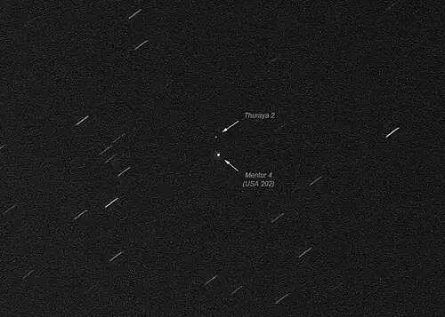 USA-202 and the nearby commercial geostationary satellite Thuraya 2