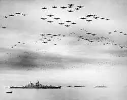 A large formation of American planes over USS Missouri and Tokyo Bay celebrating the signing, 2 September 1945.