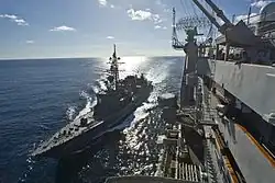 JS Ikazuchi alongside the aircraft carrier USS George Washington on 5 December 2010.