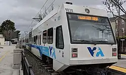 VTA bus (top) and light rail vehicle (bottom)