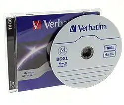 A Verbatim M-Disc BDXL 100GB in front of the jewel case