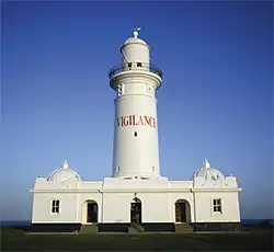 Vigilance, 1992–1993, vinyl text, Macquarie Lighthouse, dimensions variable, The Boundary Rider, 9th Biennale of Sydney, Australia. Photograph by Phil George.