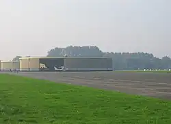 Round concrete hangars at Grimbergen Airfield, Belgium.