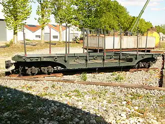 A WW I pocket wagon for transporting artillery shells. A rectangular water tank wagon is in the background.