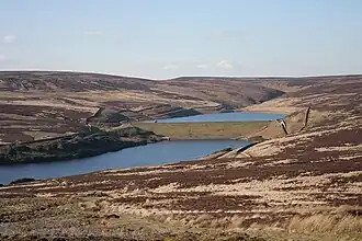Image of two reservoirs set high in a moorland valley