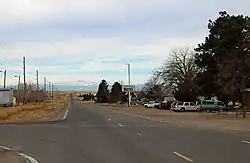 Watkins, looking west along Colfax Avenue.
