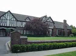 The Leonie Pray House, built for Signal Hill oilman William E. "Billy" Babb in 1927; Tudor Revival architecture by Clarence Aldrich.[26] It appears in Not Another Teen Movie, Weird Science, and Donnie Darko.
