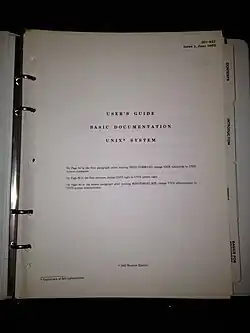 Paper punched with 7 holes, in a 4-ring binder