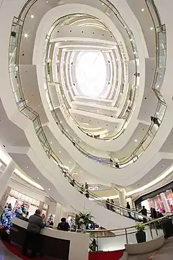 Interior atrium with curved escalators, 2011