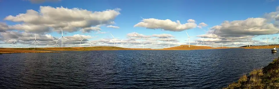 Image 10A panoramic view of the United Kingdom's Whitelee Wind Farm with Lochgoin Reservoir in the foreground. (from Wind power)