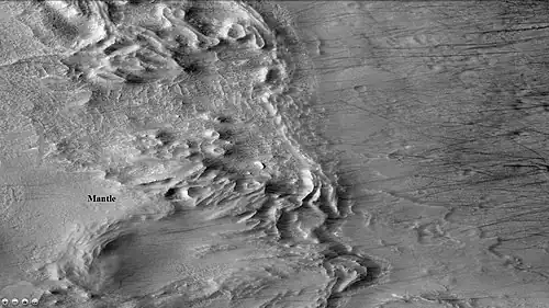 Redi Crater, showing dust devil tracks and mantle, as seen by CTX camera (on Mars Reconnaissance Orbiter). Note: this is an enlargement of the previous image of Redi Crater.