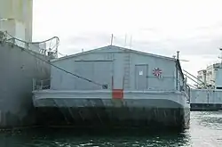 YFN-958 a covered lighter barge, non-self-propelled. Built by Mare Island Navy Shipyard in 1944.