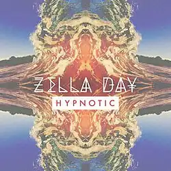 A kaleidoscope of blues, yellows, and reds combine in a visual behind the song's title and respective artist.