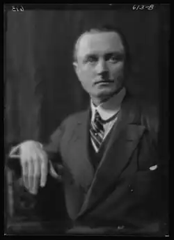 Black-and-white photographic portrait of Burden