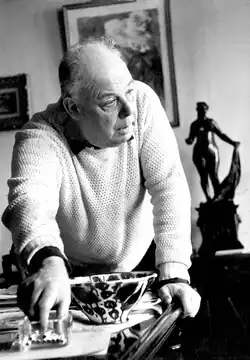Black and white photograph of Jean Renoir in his mid 60s